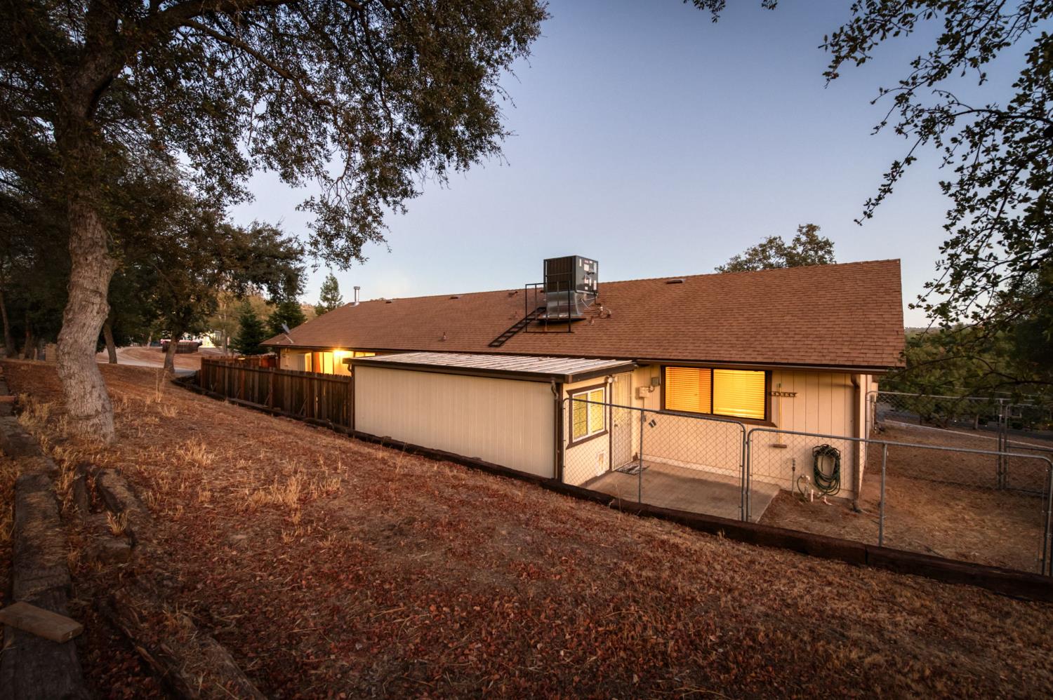 42607 Long Hollow Drive Coarsegold, CA 93614 - Photo 18 of 52 a view of a house with backyard and a tree