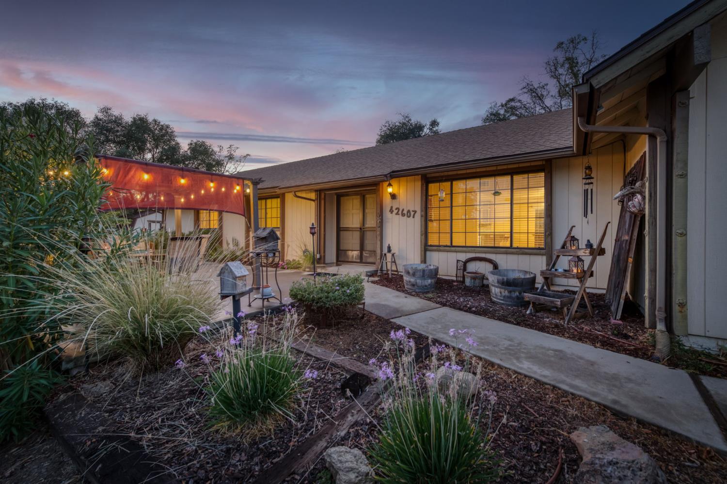 42607 Long Hollow Drive Coarsegold, CA 93614 - Photo 38 of 52 a view of a house with a patio