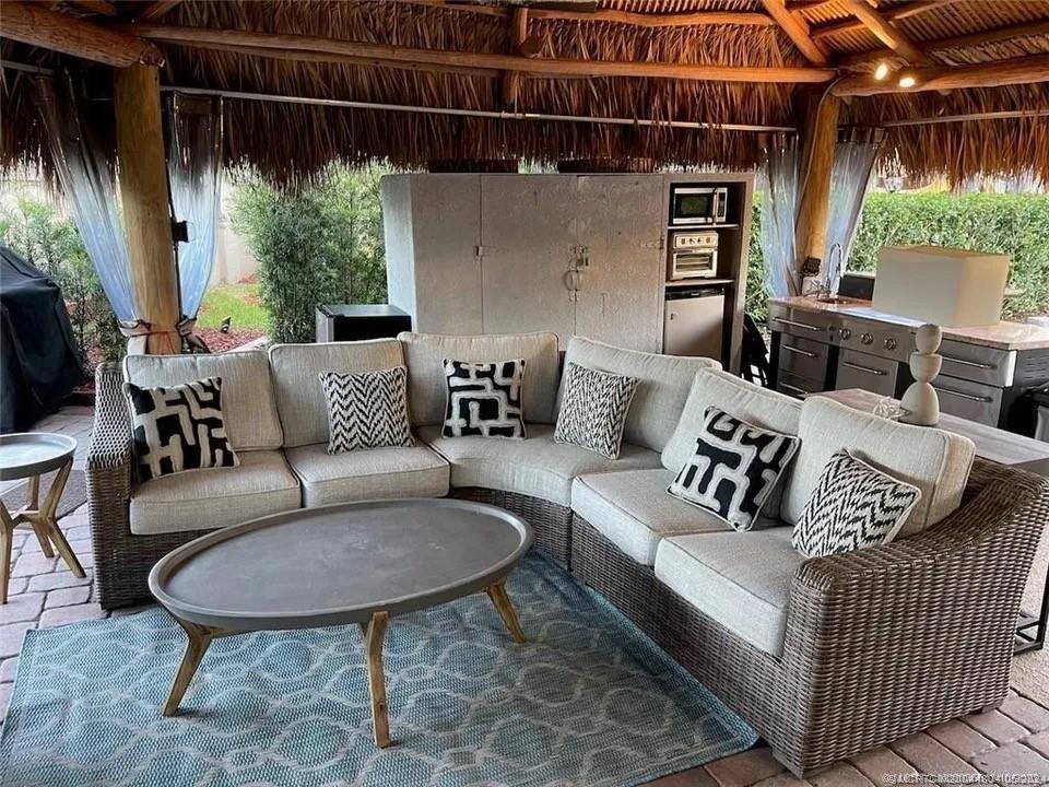 a outdoor living room with furniture