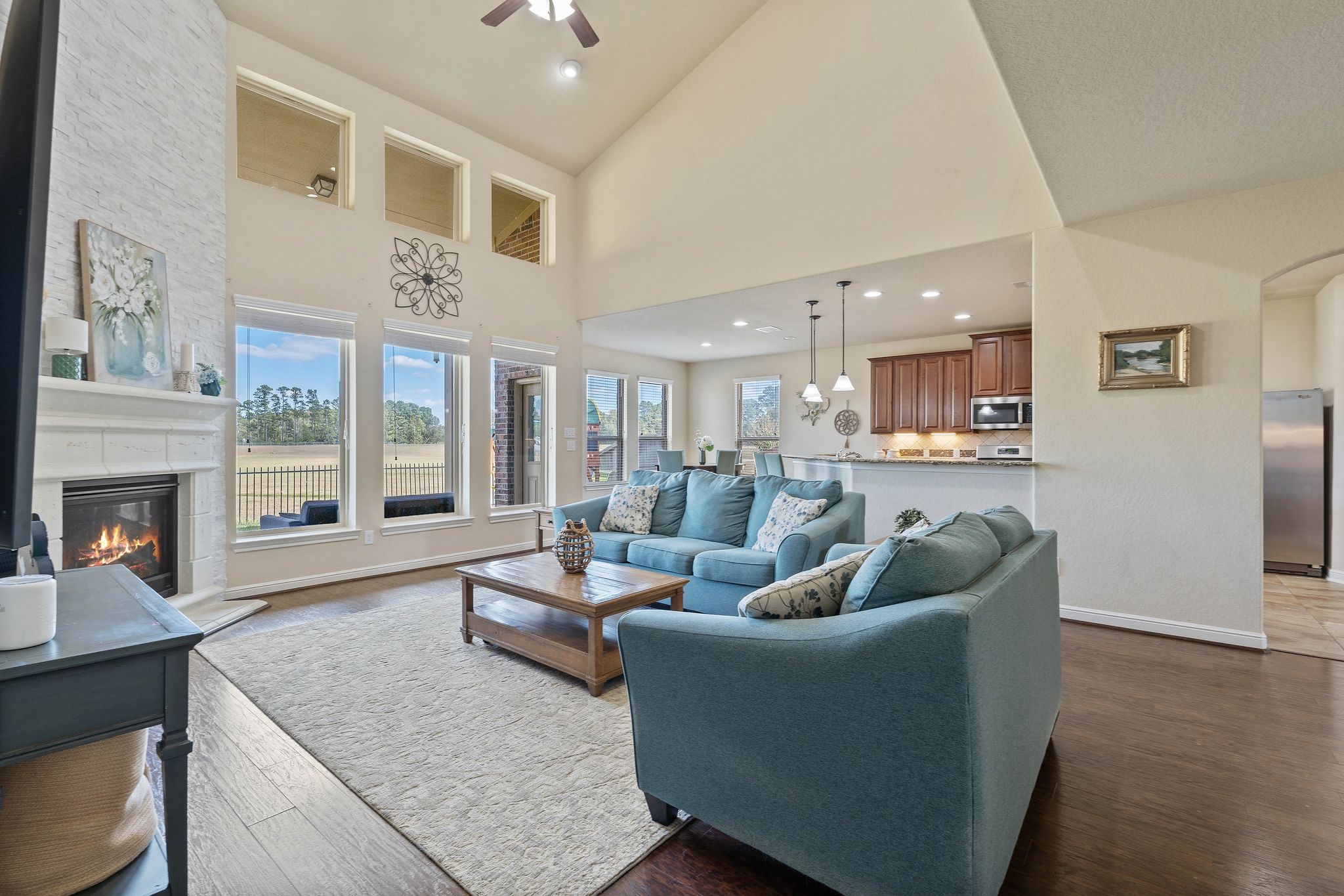 10114 North Whimbrel Circle Conroe, TX 77385 - Photo 12 of 50 a living room with furniture and fireplace