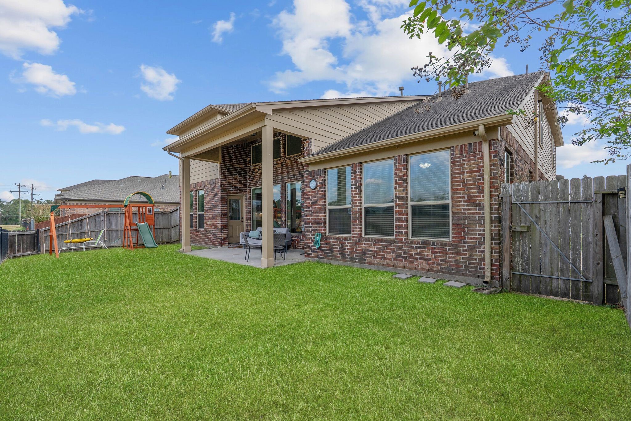 10114 North Whimbrel Circle Conroe, TX 77385 - Photo 43 of 50 a view of a house with a backyard