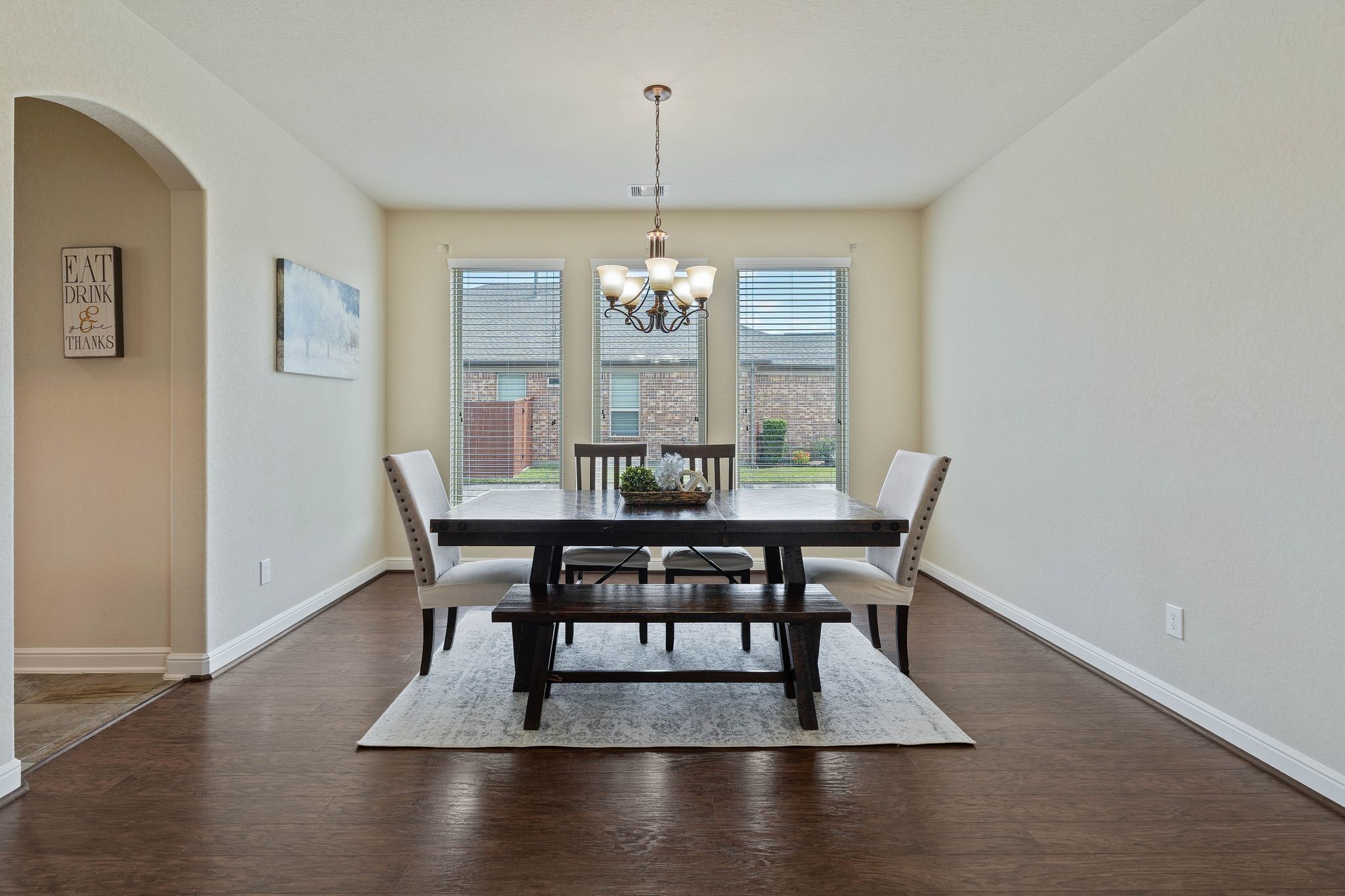 10114 North Whimbrel Circle Conroe, TX 77385 - Photo 6 of 50 a view of a dining room with furniture window and wooden floor