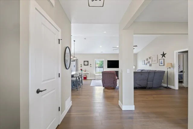 a living room with furniture and a table