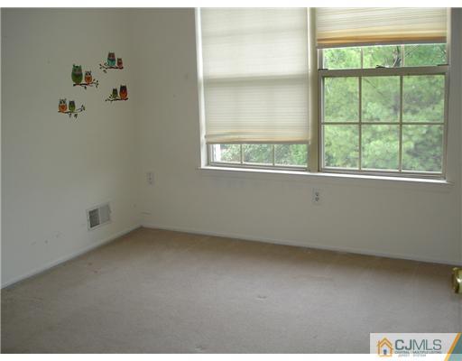 168 Salem Road North Brunswick, NJ 08902 - Photo 16 of 20 an empty room with a window