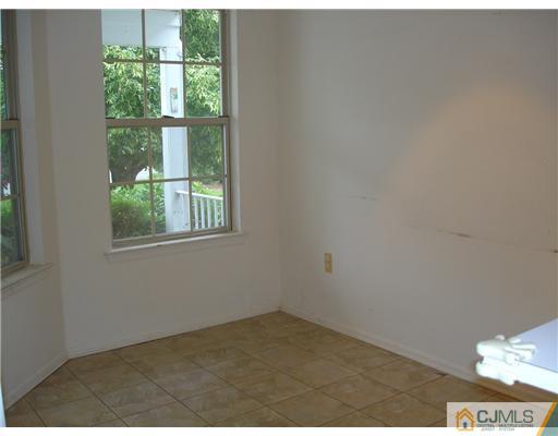 168 Salem Road North Brunswick, NJ 08902 - Photo 4 of 20 an empty room with a window