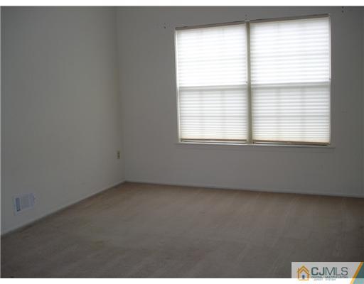 168 Salem Road North Brunswick, NJ 08902 - Photo 9 of 20 an empty room with a window