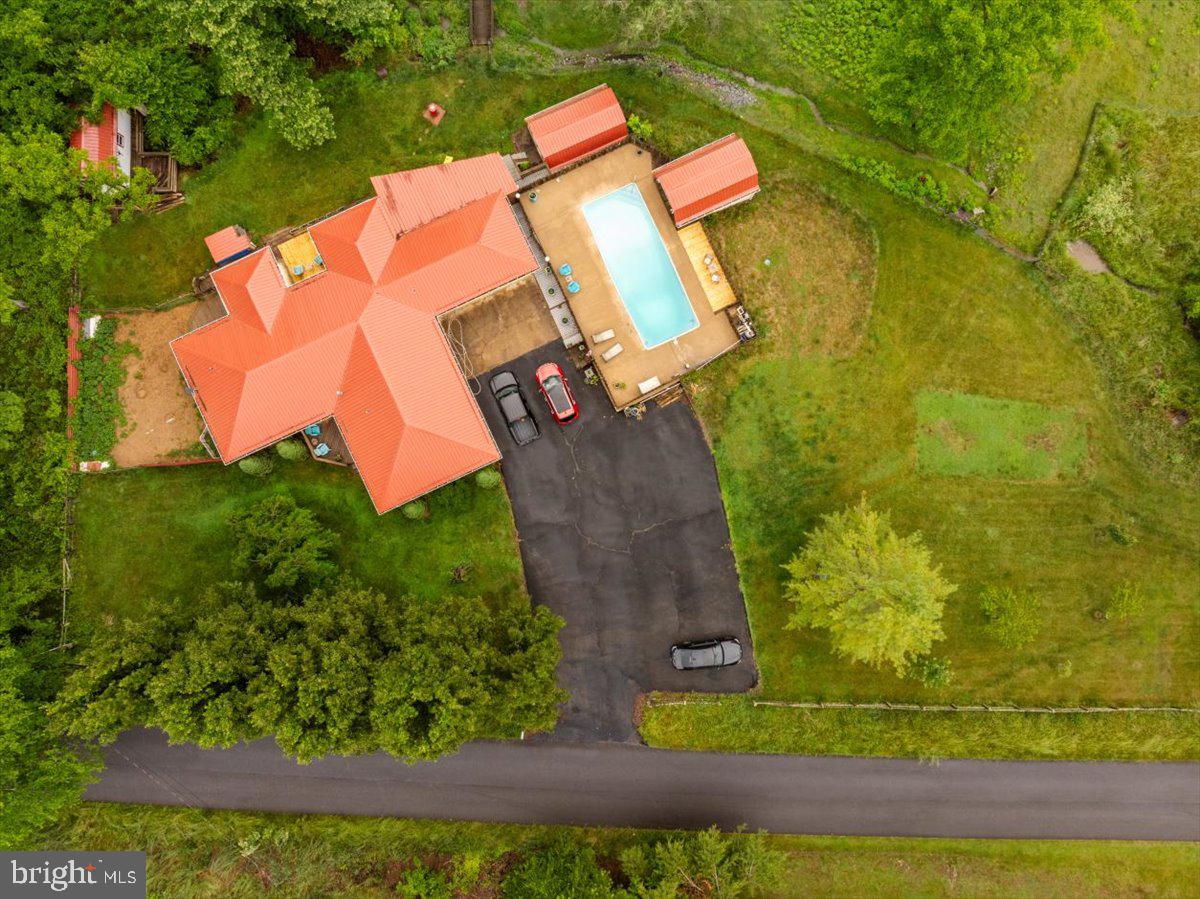 11419 Oak Grove Road Bristol, VA 24202 - Photo 2 of 36 an aerial view of a house with a yard and pool