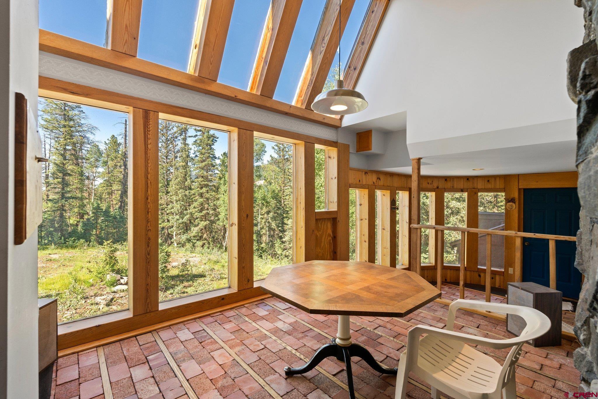 1389 County Road 240 Durango, CO 81301 - Photo 11 of 35 a view of a room with furniture and large windows