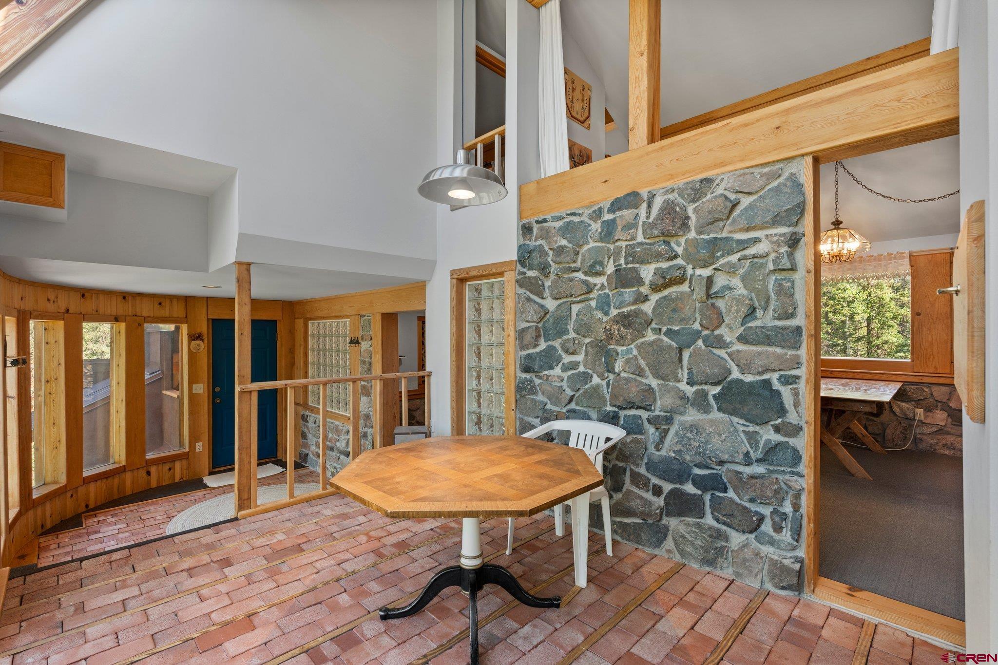 1389 County Road 240 Durango, CO 81301 - Photo 13 of 35 a view of a dining room with furniture window and wooden floor