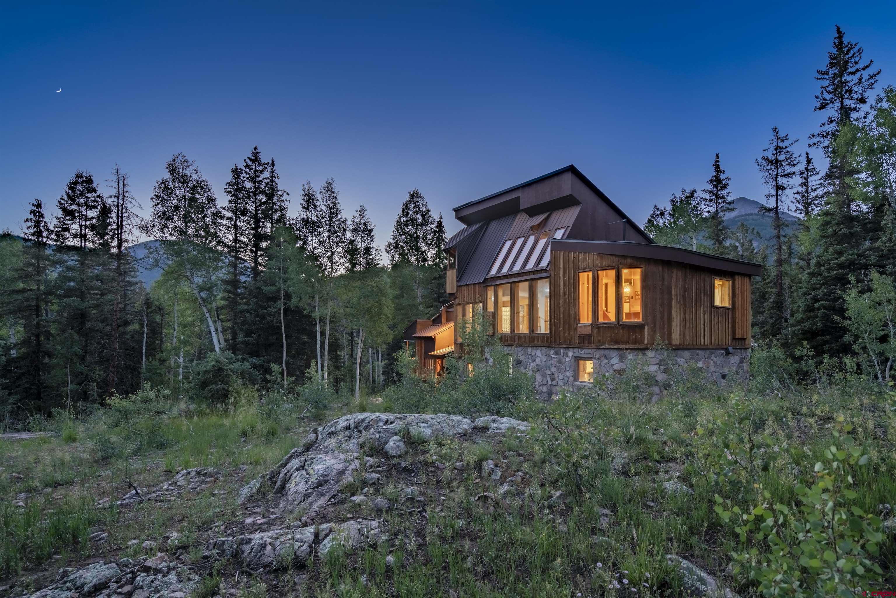 1389 County Road 240 Durango, CO 81301 - Photo 14 of 35 a backyard of a house with lots of green space