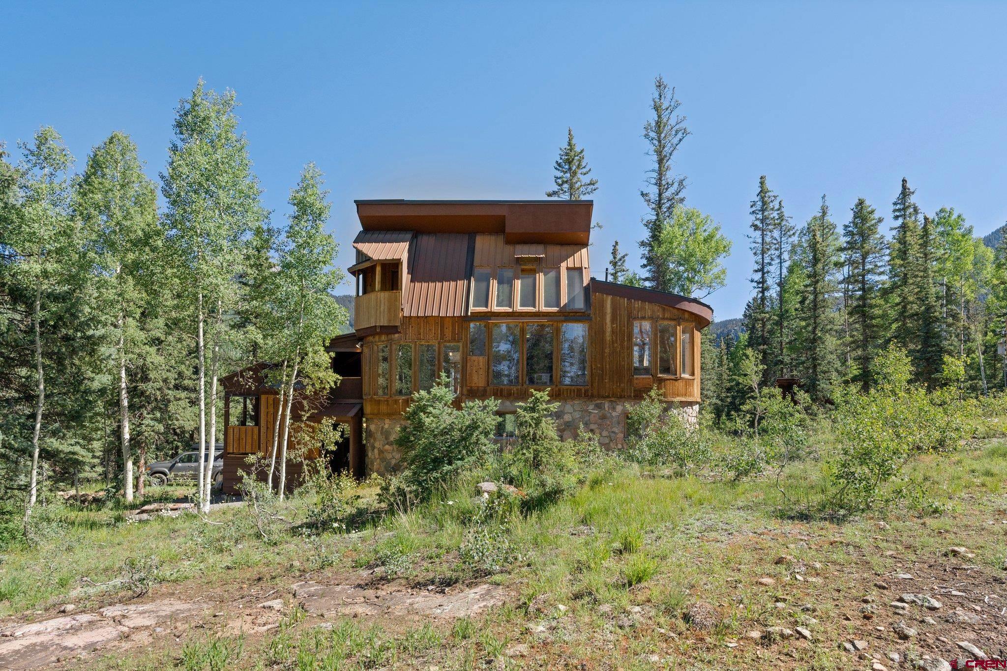 1389 County Road 240 Durango, CO 81301 - Photo 18 of 35 a view of a house with a yard