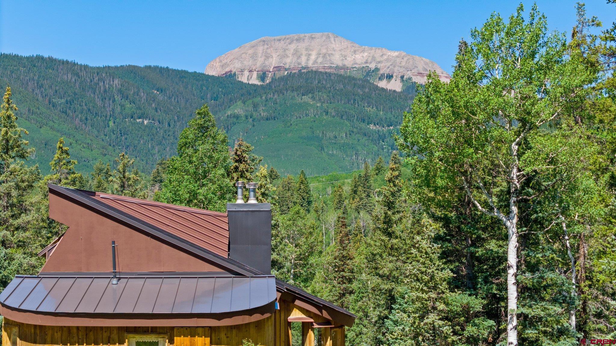 1389 County Road 240 Durango, CO 81301 - Photo 21 of 35 a view of a big yard next to a house