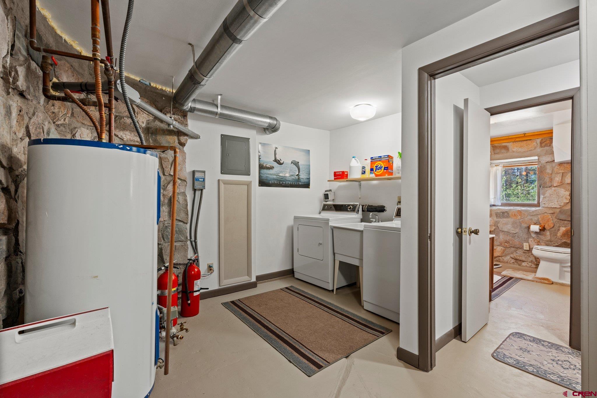 1389 County Road 240 Durango, CO 81301 - Photo 34 of 35 a room with storage and utility