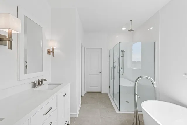 a bathroom with a double vanity sink and mirror