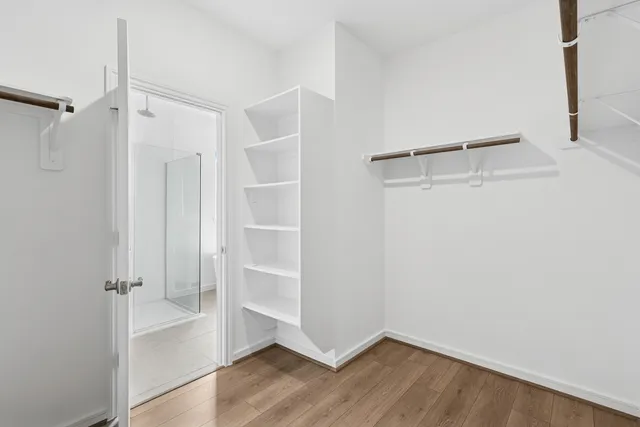 a bathroom with a sink mirror and toilet