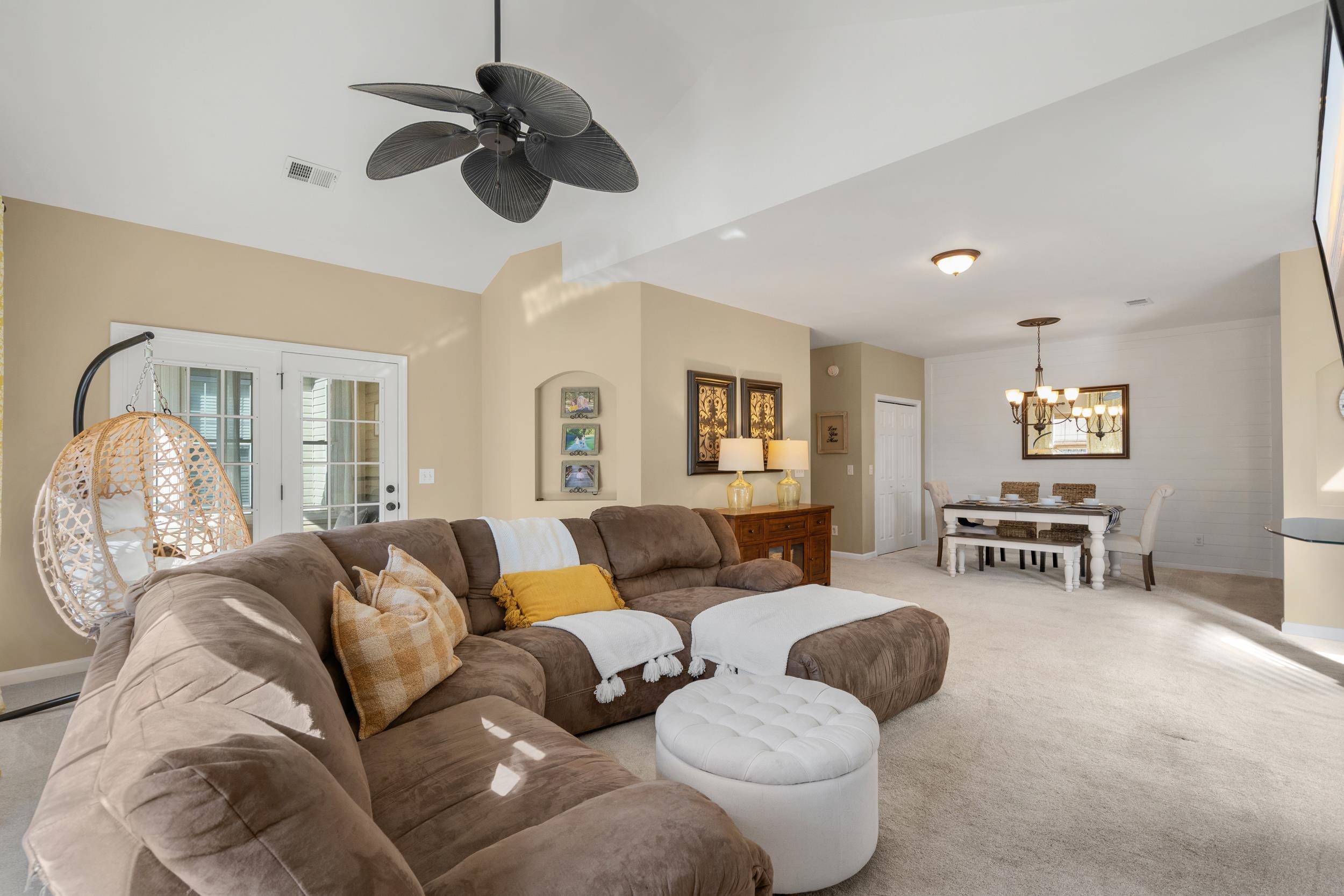 4436 Lady Banks Lane, Unit B2 Murrells Inlet, SC 29576 - Photo 6 of 36 Living room with light carpet and ceiling fan