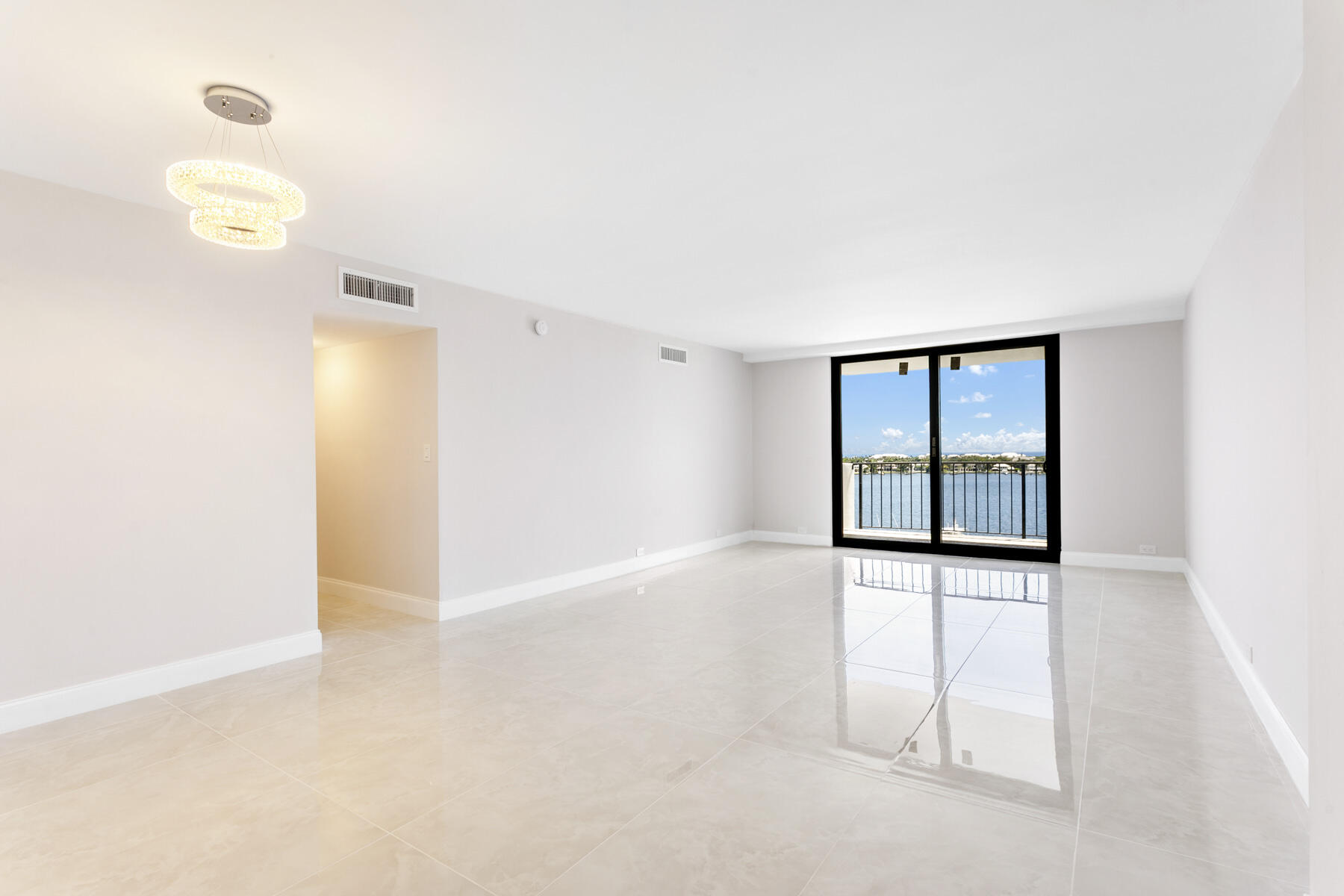 1200 Marine Way, Unit 802 North Palm Beach, FL 33408 - Photo 13 of 34 wooden floor in an empty room with a window