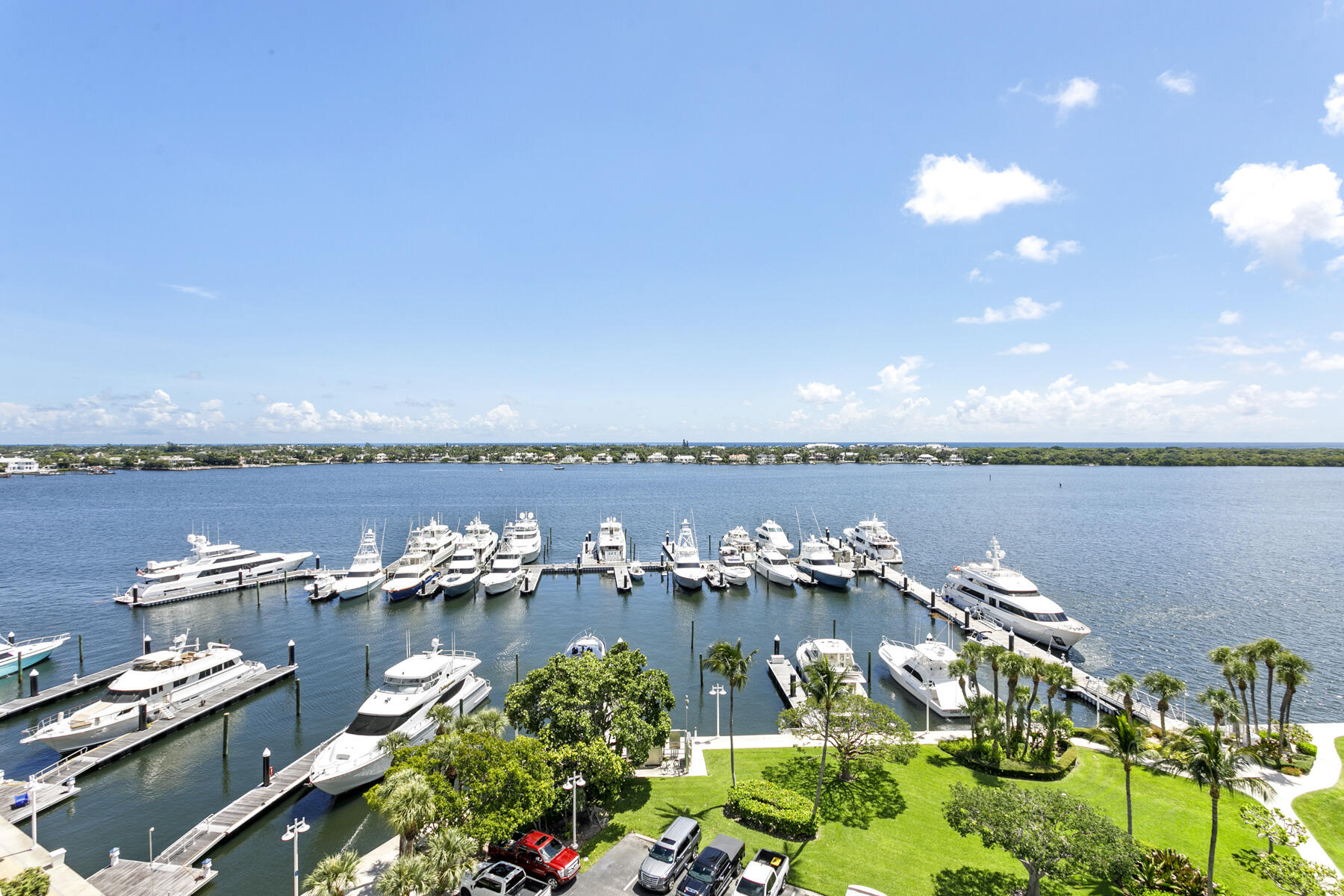 1200 Marine Way, Unit 802 North Palm Beach, FL 33408 - Photo 2 of 34 a view of a lake with a large trees all around