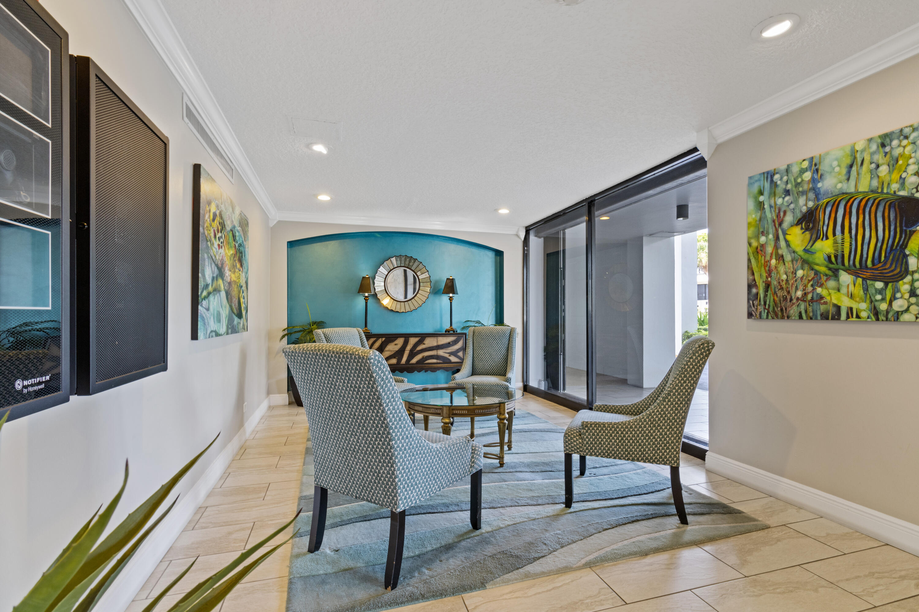 1200 Marine Way, Unit 802 North Palm Beach, FL 33408 - Photo 24 of 34 a view of a dining room with furniture one side kitchen view and a window