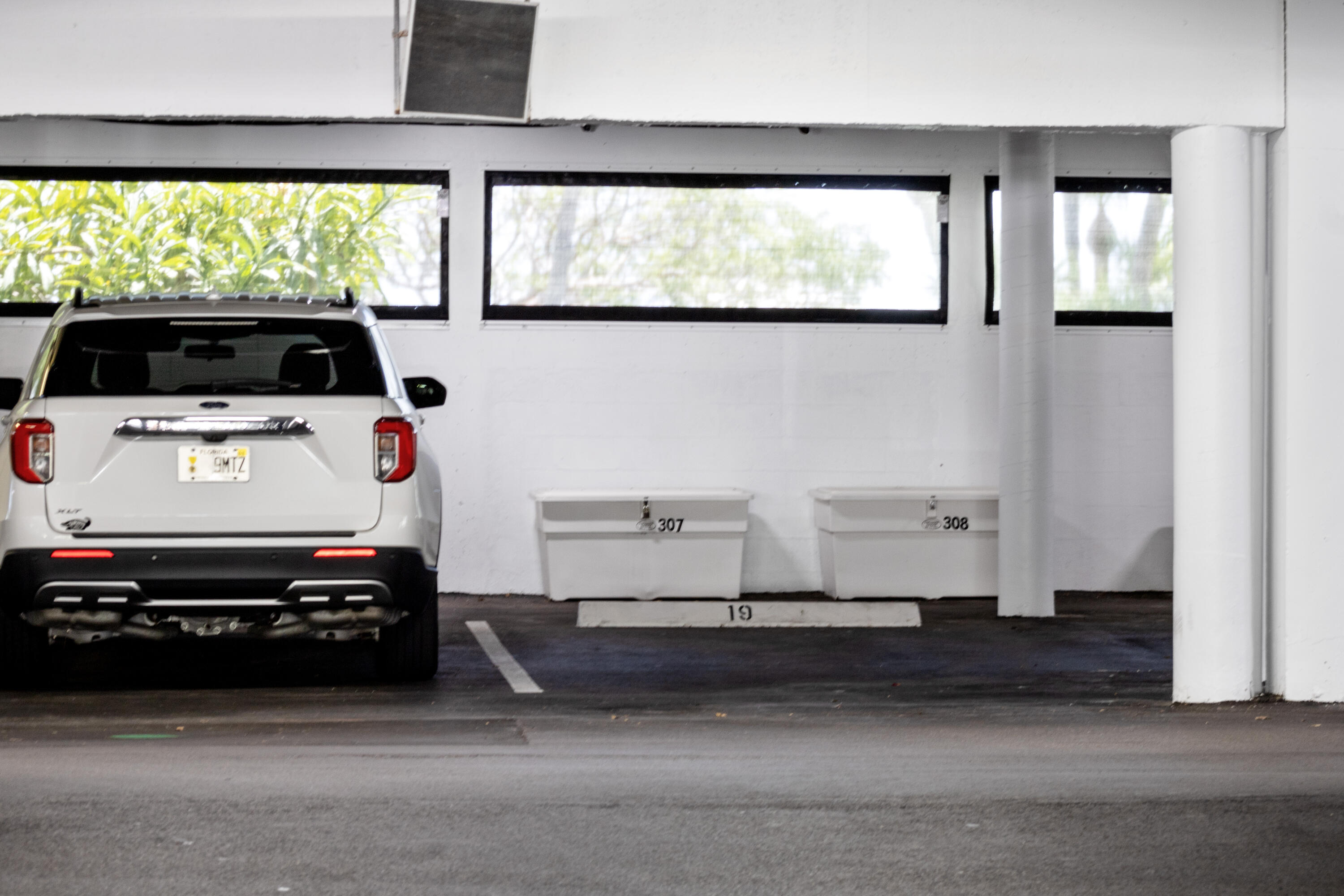 1200 Marine Way, Unit 802 North Palm Beach, FL 33408 - Photo 28 of 34 a car parked in front of a building