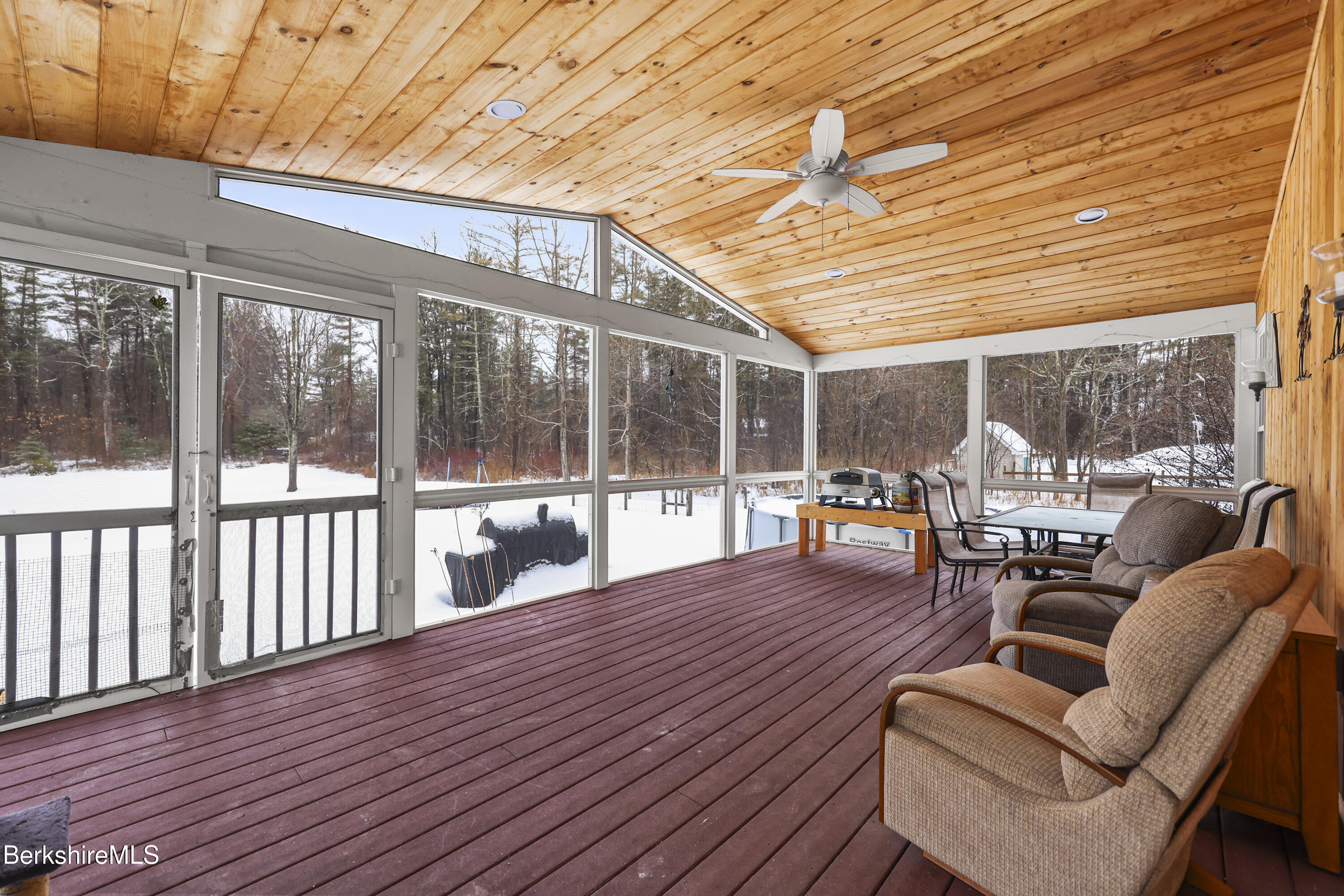 121 W Road Lee, MA 01238 - Photo 19 of 48 a balcony with furniture and wooden floor