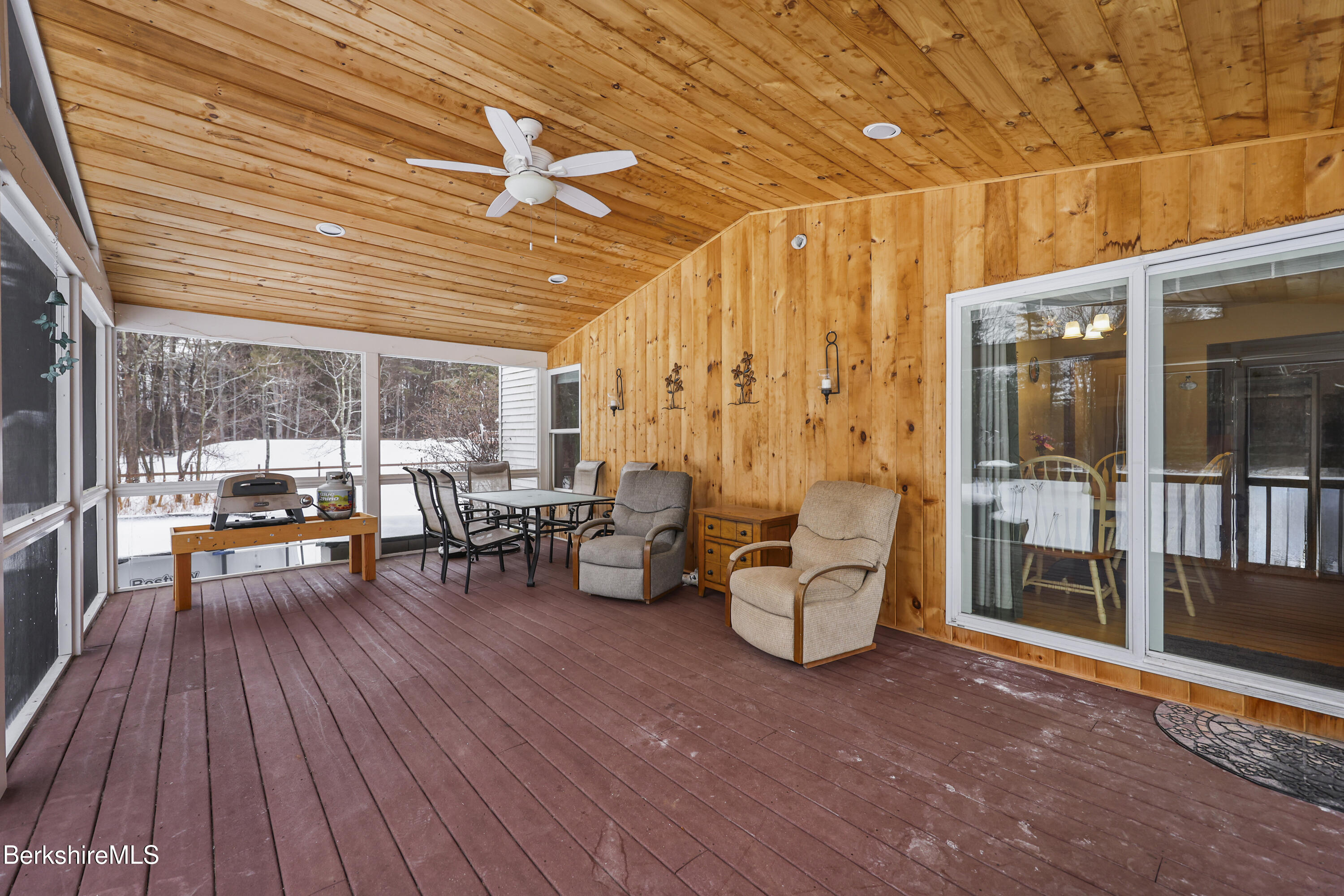 121 W Road Lee, MA 01238 - Photo 20 of 48 a view of a patio with chairs and potted plants
