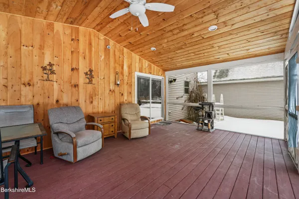 a view of livingroom with furniture and a flat screen tv