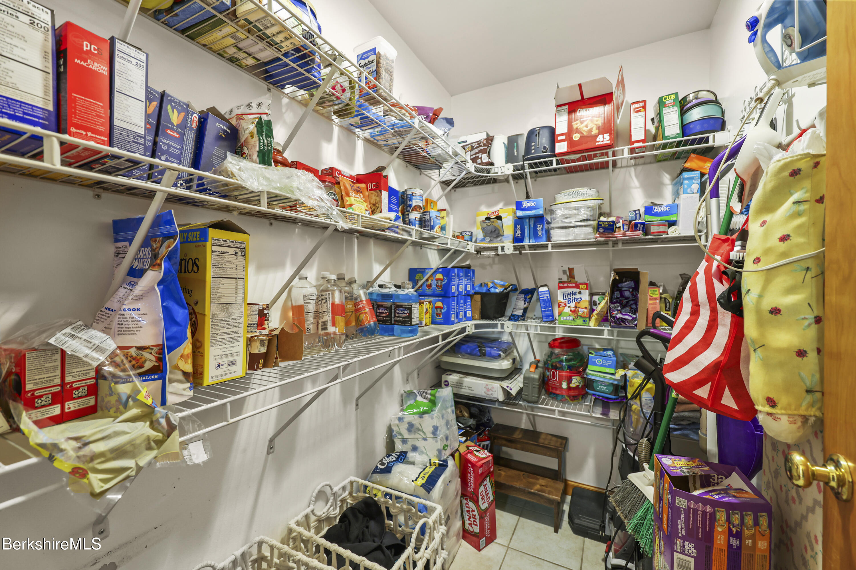 121 W Road Lee, MA 01238 - Photo 22 of 48 a store room with lots of storage and a utility