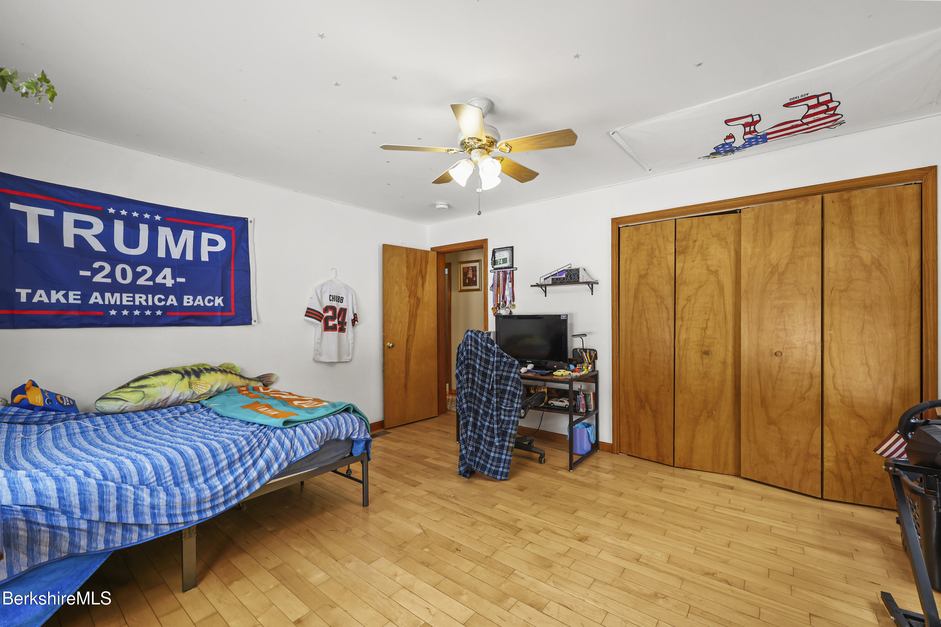 121 W Road Lee, MA 01238 - Photo 24 of 48 a bedroom with a bed and a desk