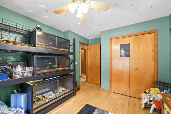 a kitchen with stainless steel appliances granite countertop a refrigerator and a stove