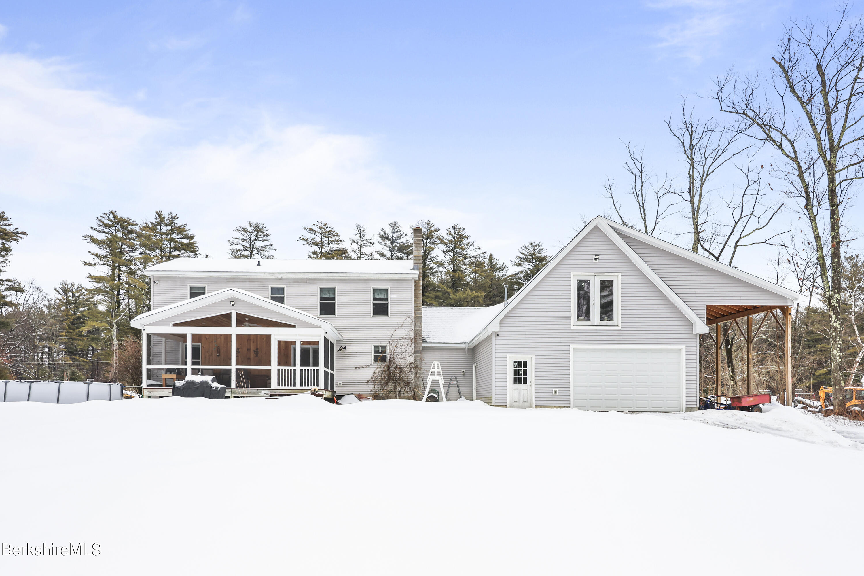 121 W Road Lee, MA 01238 - Photo 3 of 48 a front view of a house with a yard