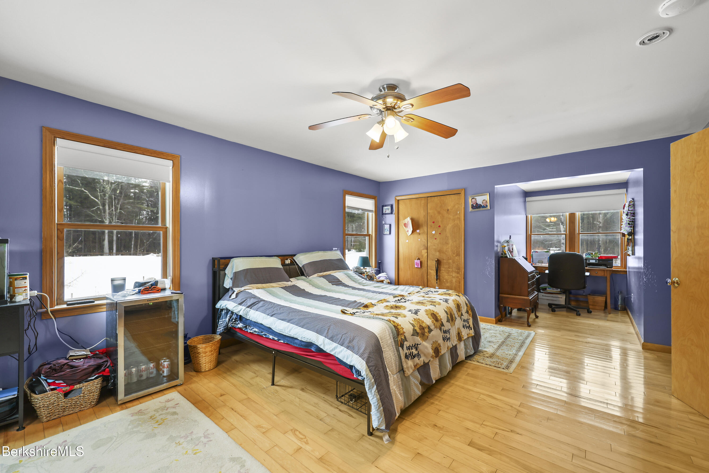 121 W Road Lee, MA 01238 - Photo 32 of 48 a bedroom with a bed and wooden floor