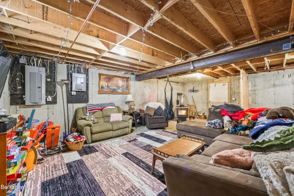 a room with lots of furniture and clutter