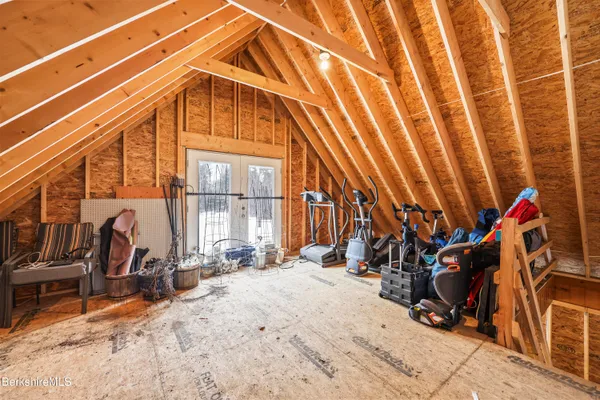 a view of a snow with trees in the background