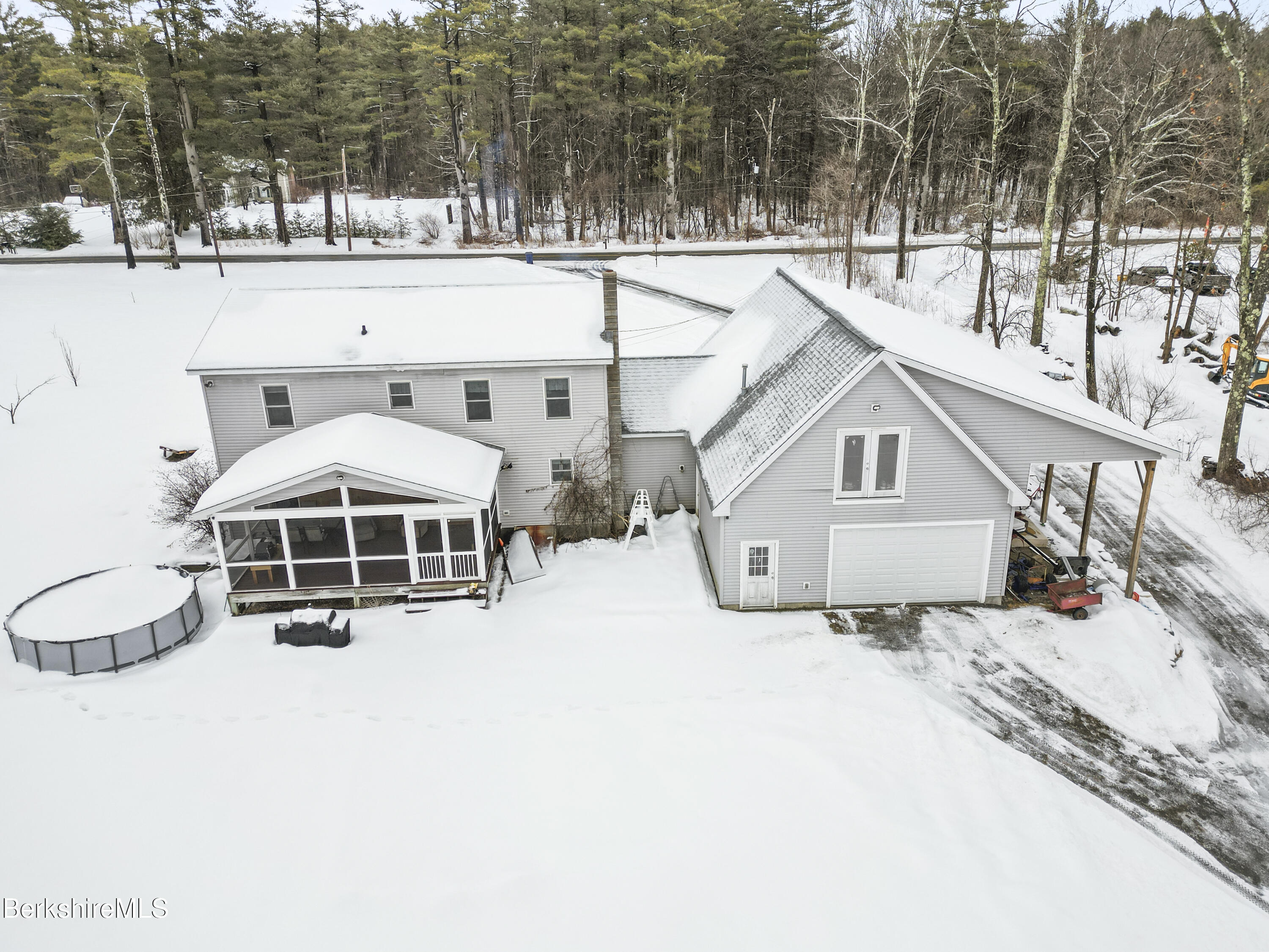 121 W Road Lee, MA 01238 - Photo 45 of 48 a view of a house with a yard and sitting area