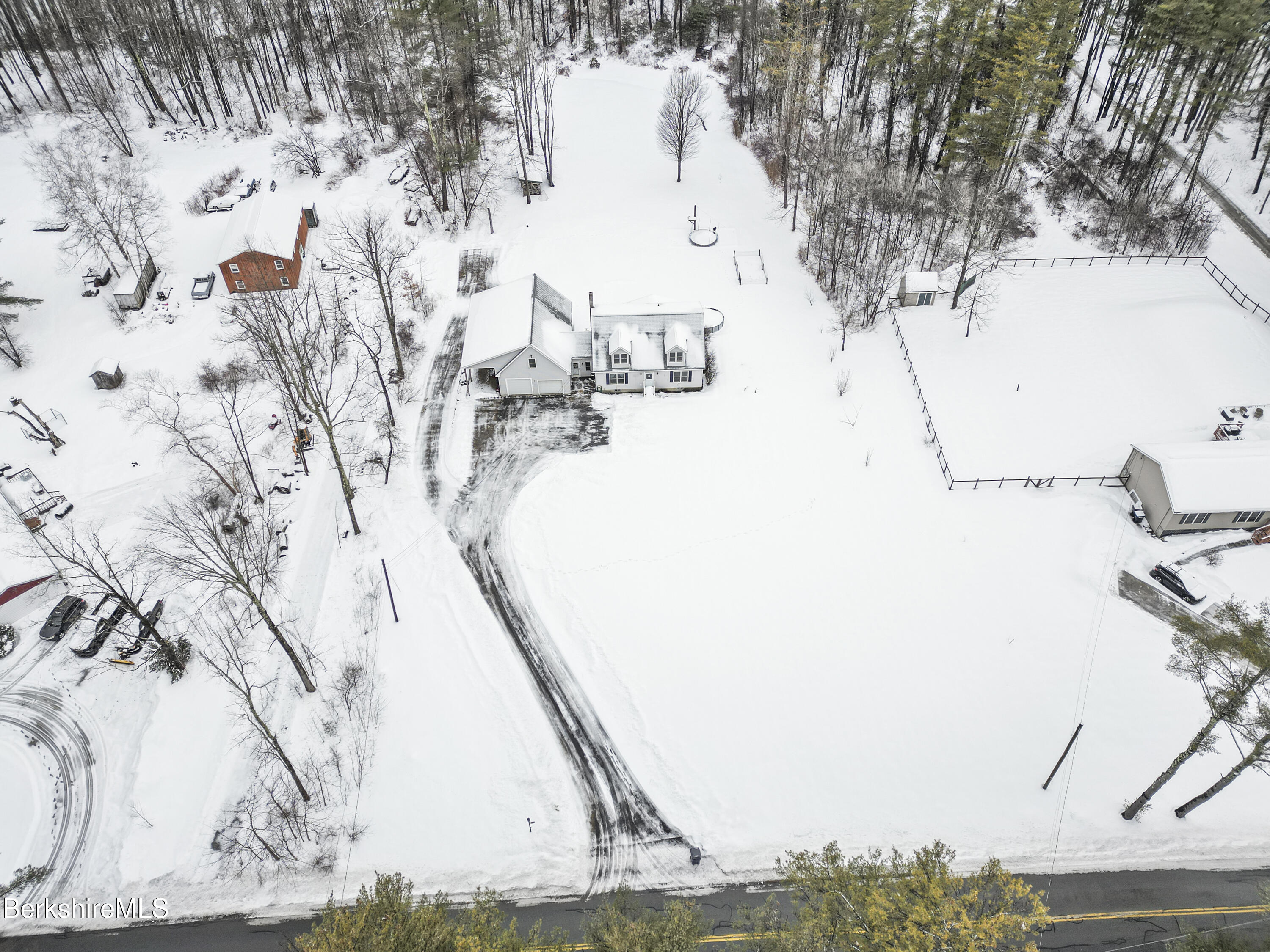 121 W Road Lee, MA 01238 - Photo 46 of 48 a view of tree covered with snow in the background