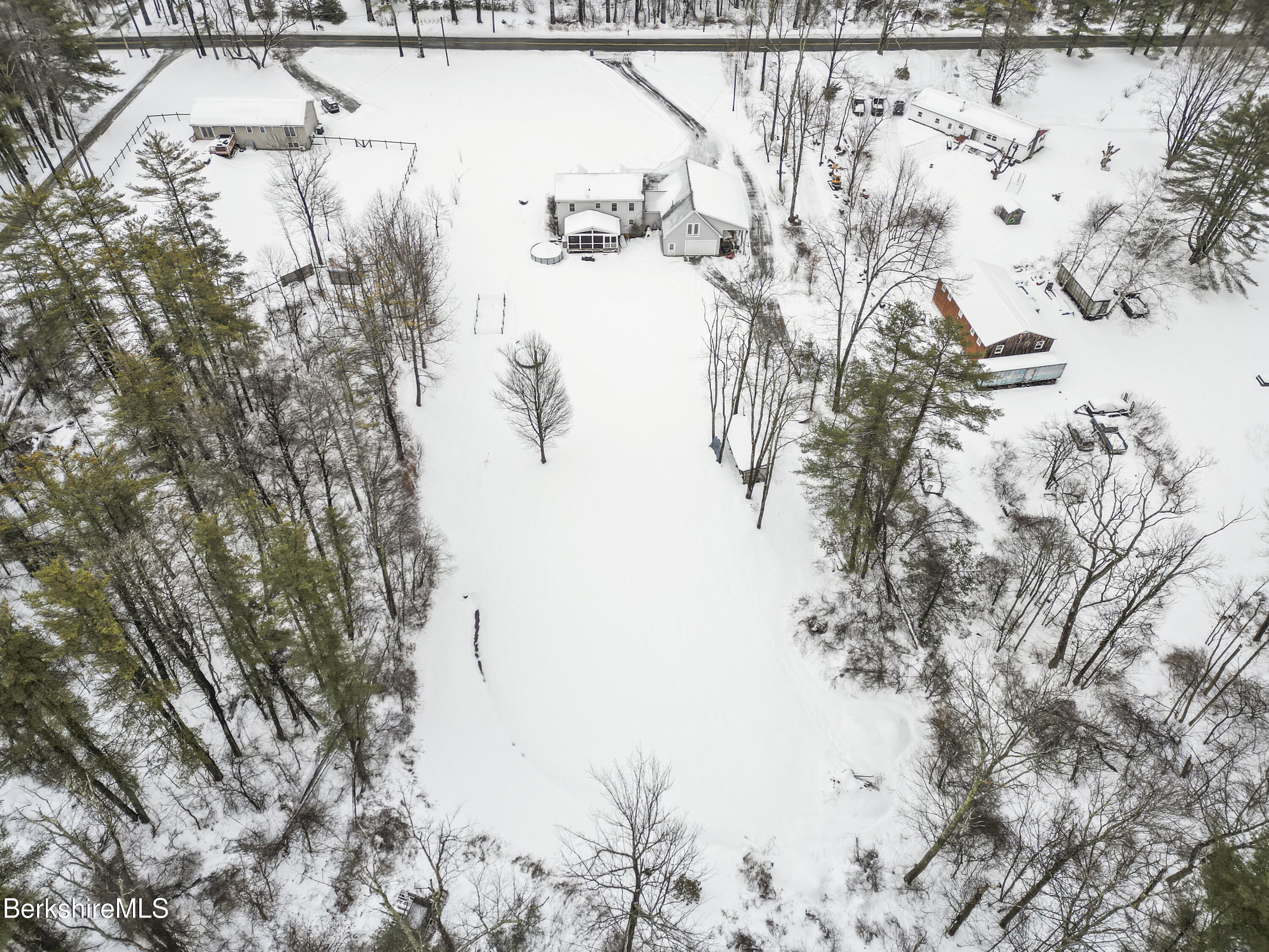 121 W Road Lee, MA 01238 - Photo 48 of 48 a backyard of a house with large trees
