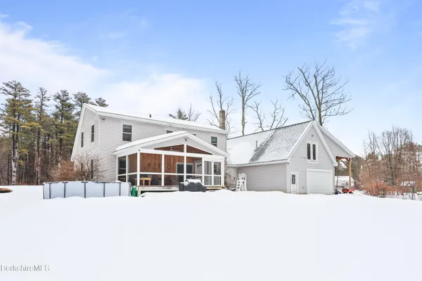 a house with trees in front of it