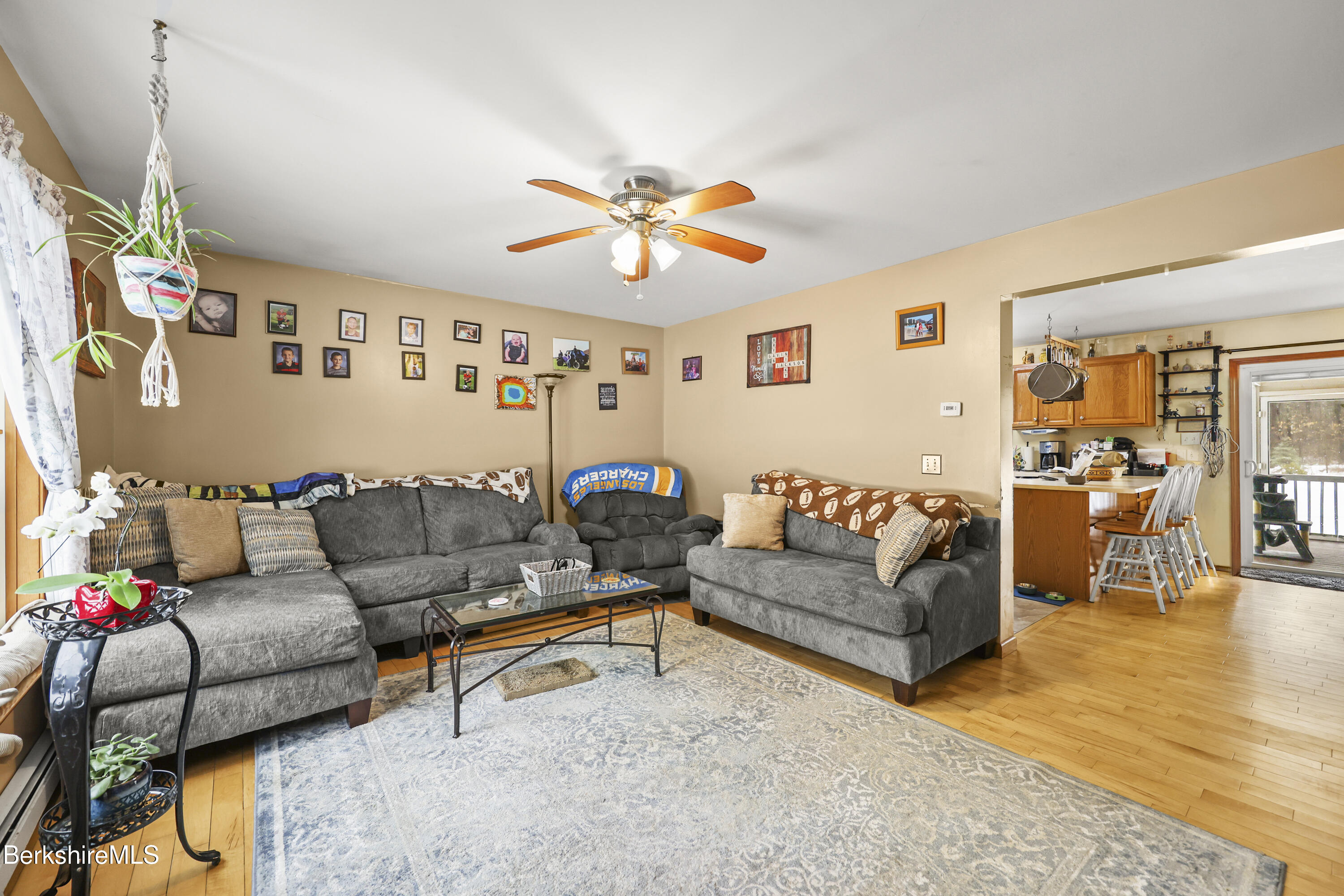 121 W Road Lee, MA 01238 - Photo 7 of 48 a living room with furniture and wooden floor
