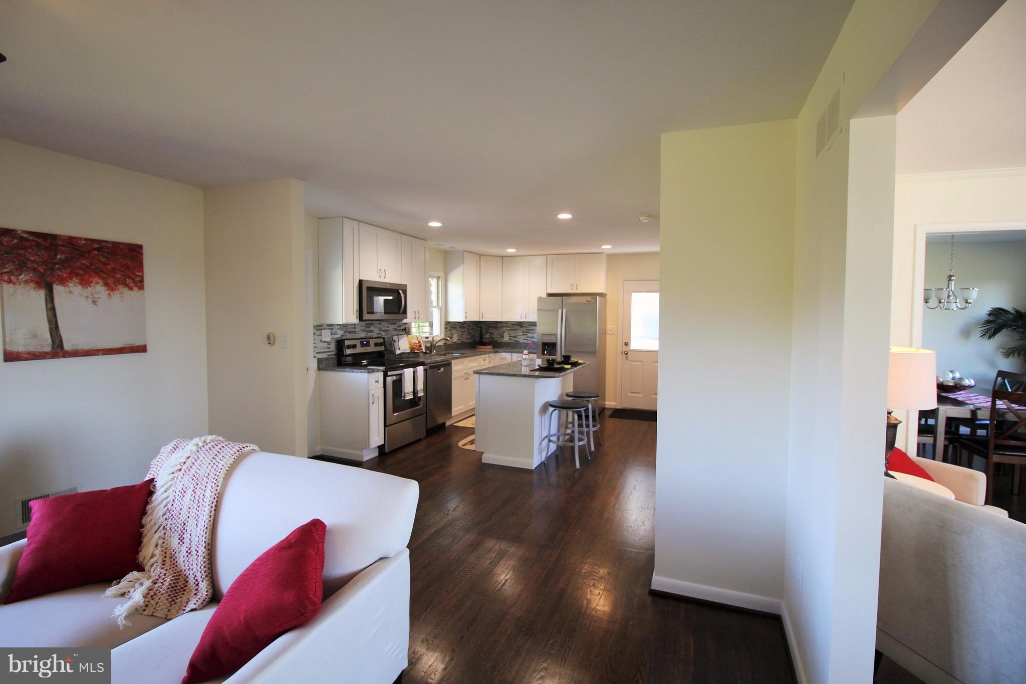 12805 Bunker Hill Road Union Bridge, MD 21791 - Photo 12 of 30 a living room with furniture and kitchen view