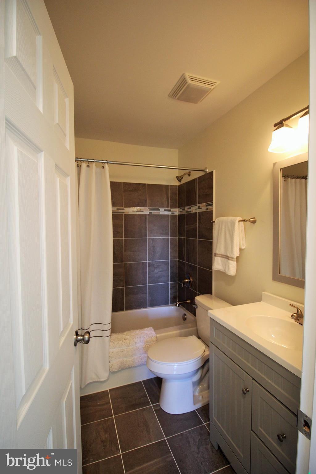 12805 Bunker Hill Road Union Bridge, MD 21791 - Photo 16 of 30 a bathroom with a sink toilet and shower