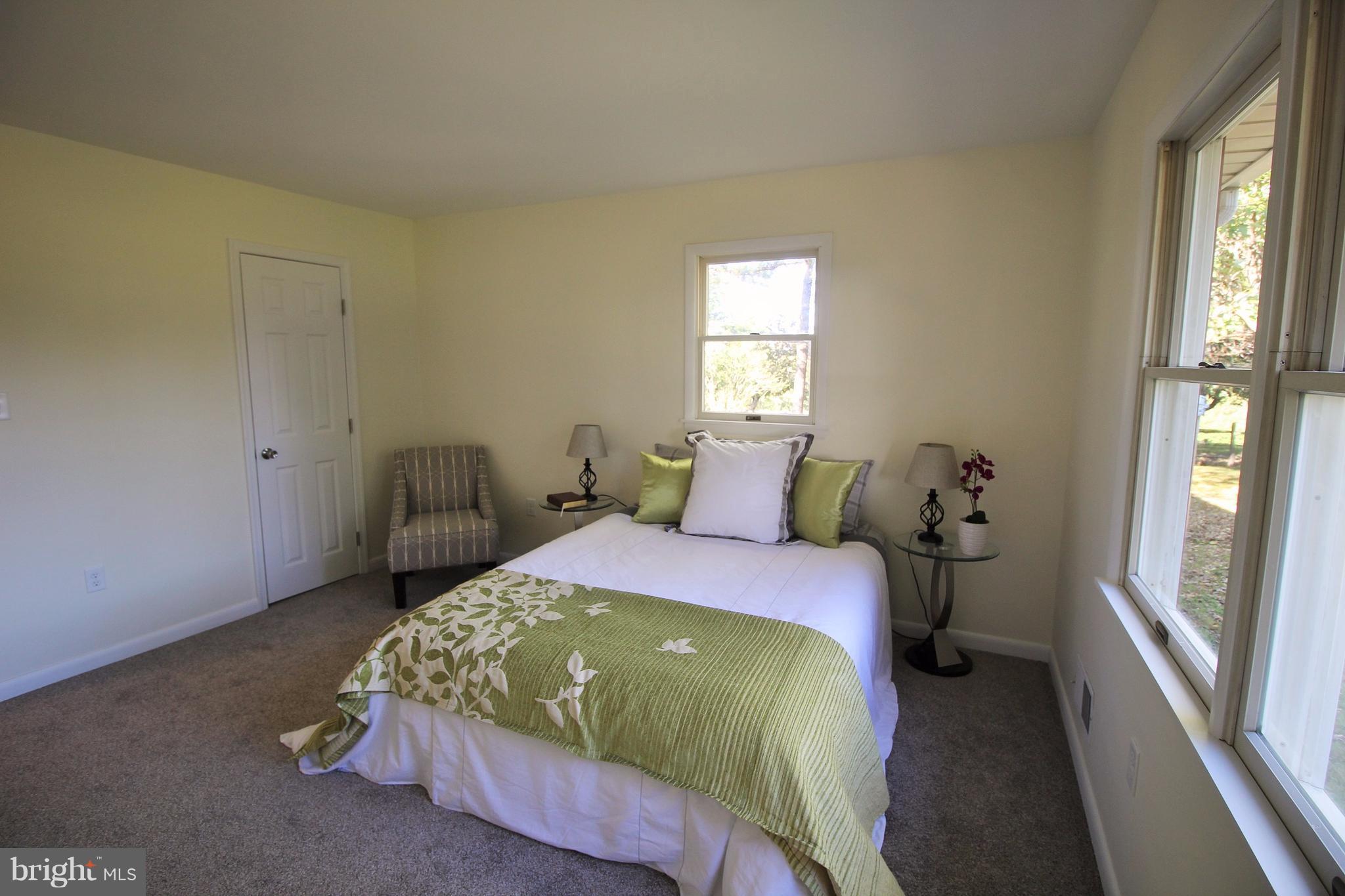 12805 Bunker Hill Road Union Bridge, MD 21791 - Photo 18 of 30 a bedroom with a bed and a window