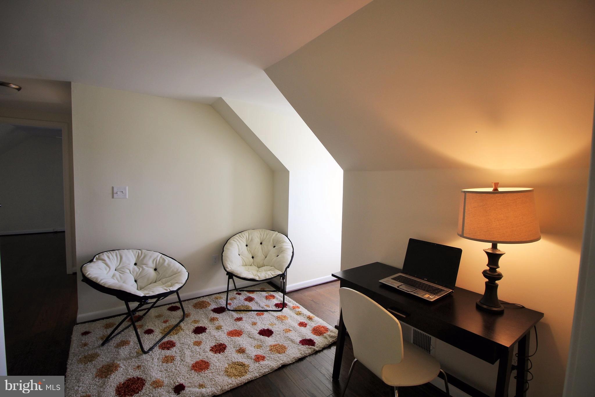 12805 Bunker Hill Road Union Bridge, MD 21791 - Photo 21 of 30 a living room with furniture and a table