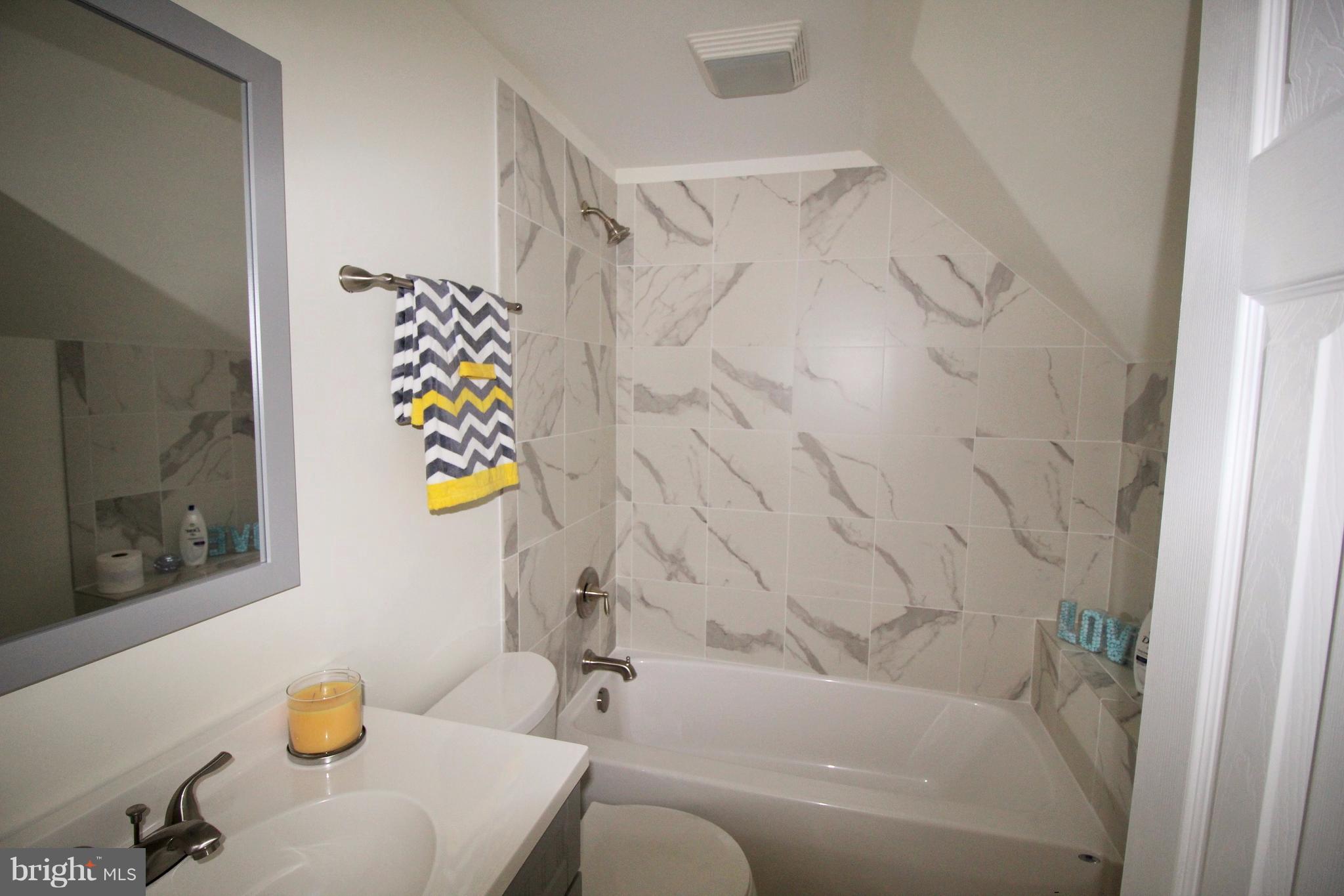 12805 Bunker Hill Road Union Bridge, MD 21791 - Photo 22 of 30 a bathroom with a sink and bathtub with shower
