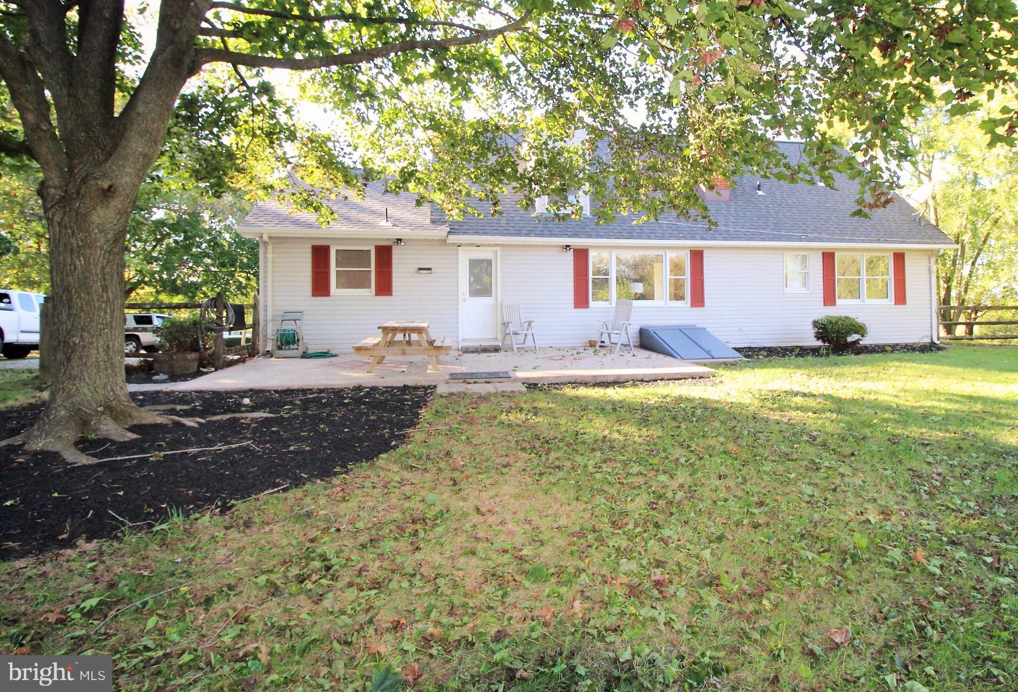 12805 Bunker Hill Road Union Bridge, MD 21791 - Photo 29 of 30 a front view of a house with yard patio and fire pit