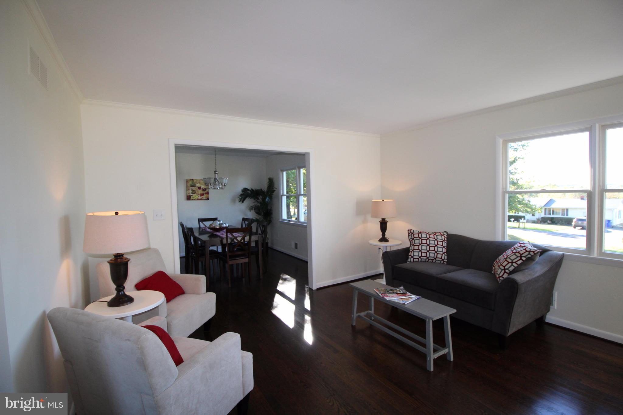 12805 Bunker Hill Road Union Bridge, MD 21791 - Photo 4 of 30 a living room with furniture and wooden floor