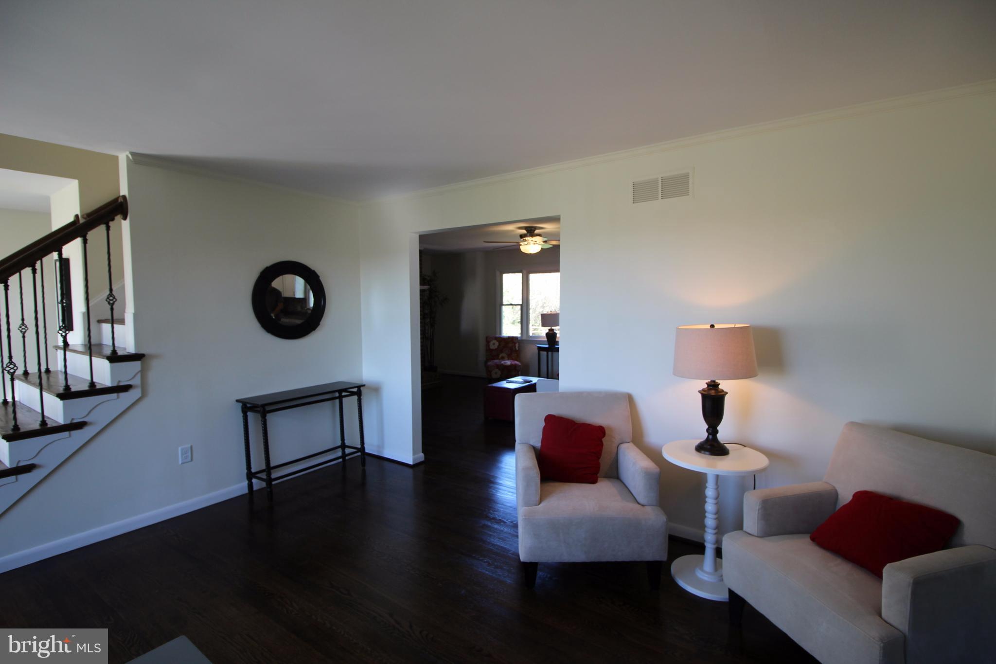 12805 Bunker Hill Road Union Bridge, MD 21791 - Photo 8 of 30 a living room with furniture and a wooden floor