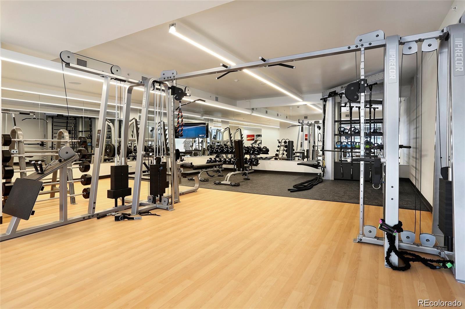 1750 Wewatta Street, Unit 1202 Denver, CO 80202 - Photo 13 of 16 a view of a room with gym equipment
