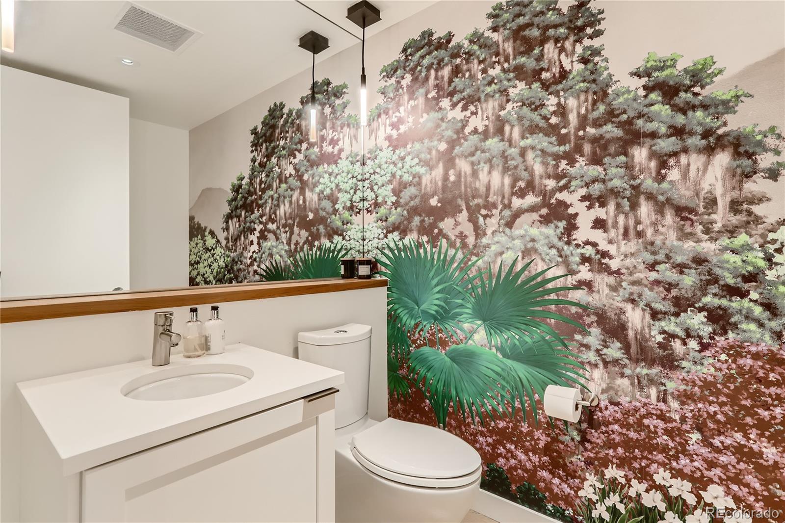 1750 Wewatta Street, Unit 1202 Denver, CO 80202 - Photo 6 of 16 a bathroom with a sink toilet and vanity