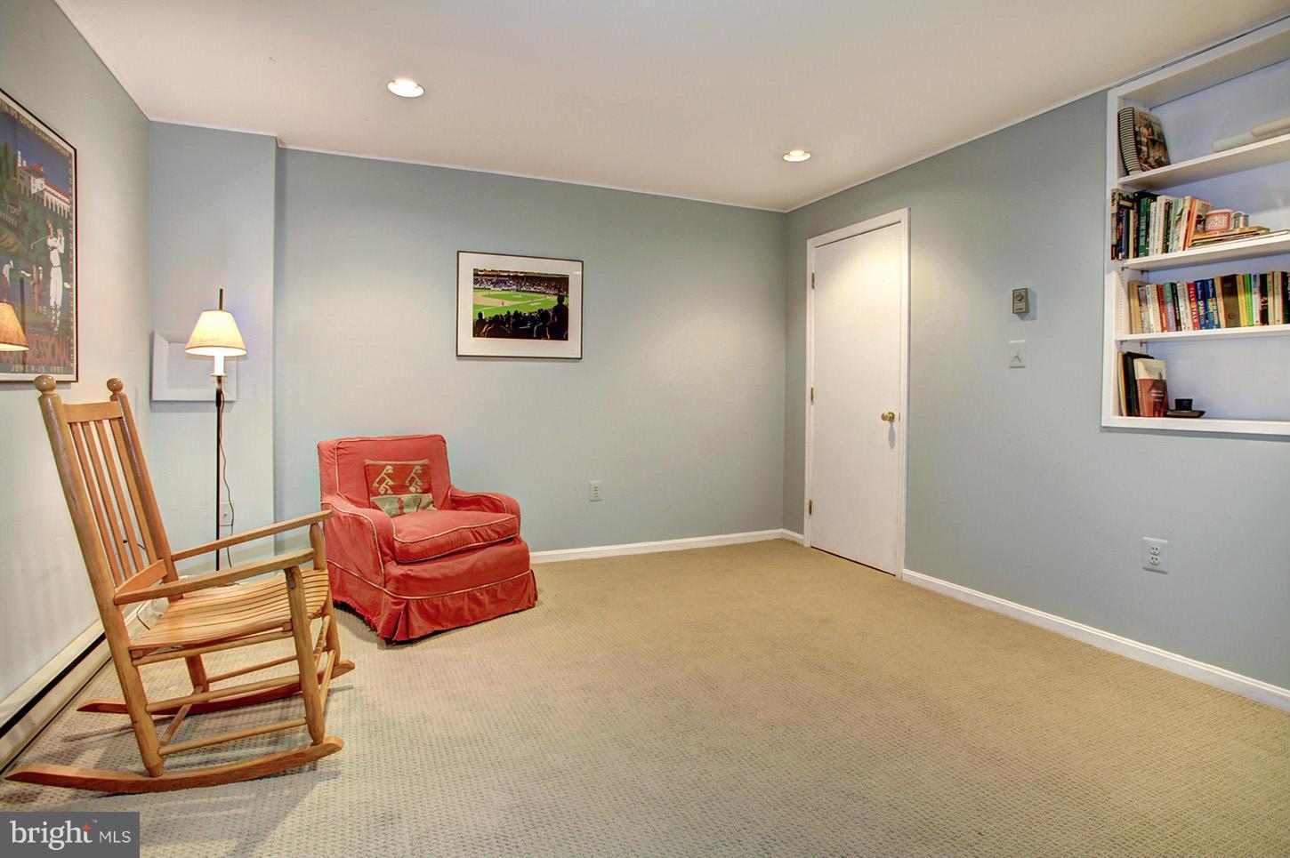 22316 West Harris Road Barnesville, MD 20838 - Photo 23 of 30 a view of a livingroom with furniture and a book shelf